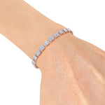 Load image into Gallery viewer, Baguette tennis bracelet in yellow gold with white diamonds of 3.50 ct in weight