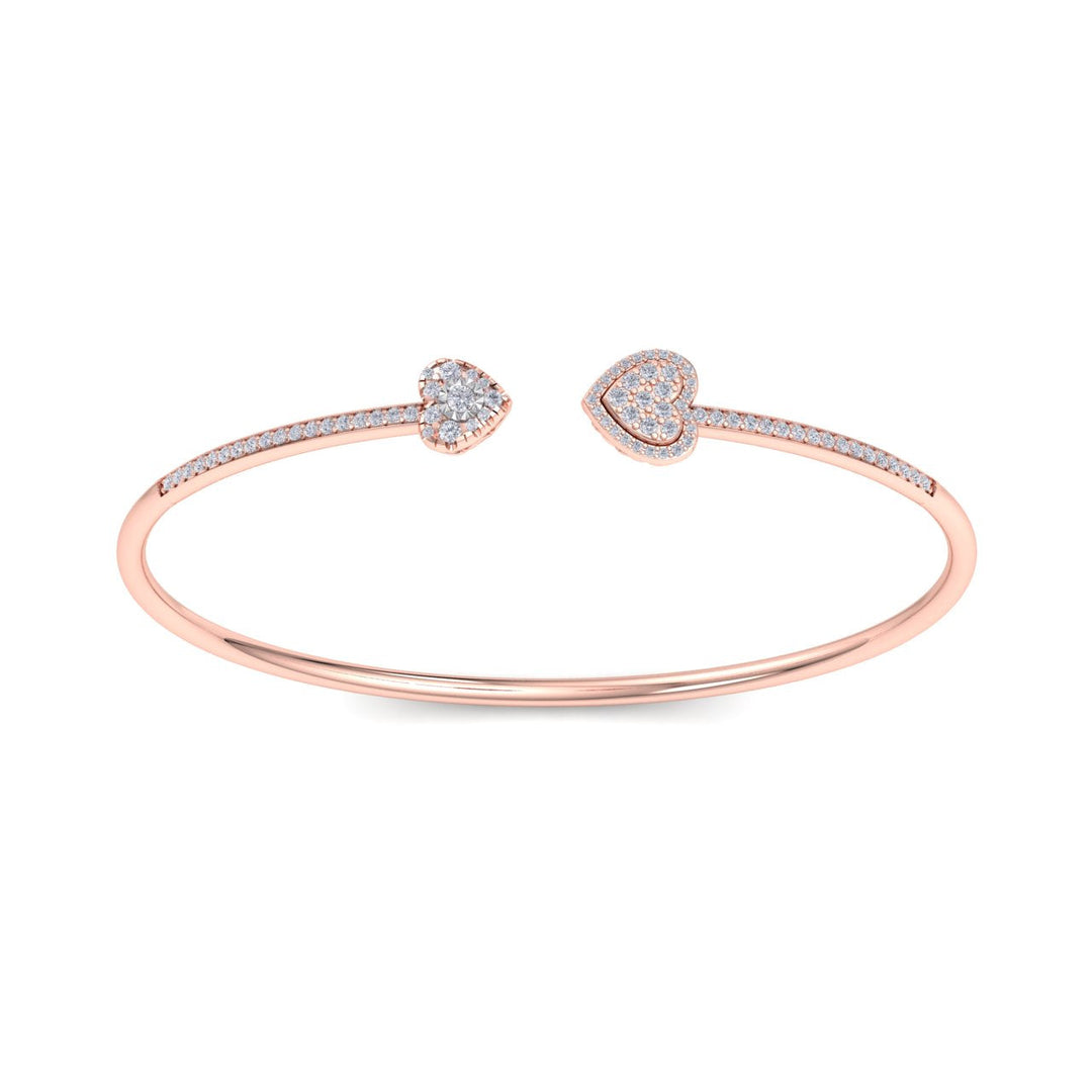 Hearts cuff bracelet in yellow gold with white diamonds of 0.56 ct in weight