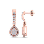 Load image into Gallery viewer, Pear drop earrings in yellow gold with white diamonds in 0.79 ct in weight