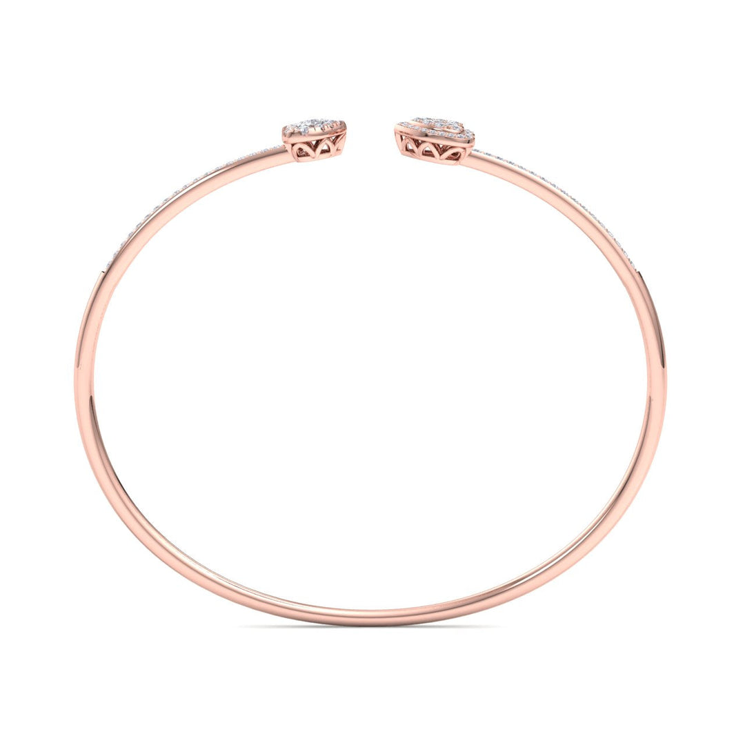 Hearts cuff bracelet in yellow gold with white diamonds of 0.56 ct in weight