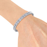 Load image into Gallery viewer, Baguette tennis bracelet in yellow gold with white diamonds of 5.20 ct in weight