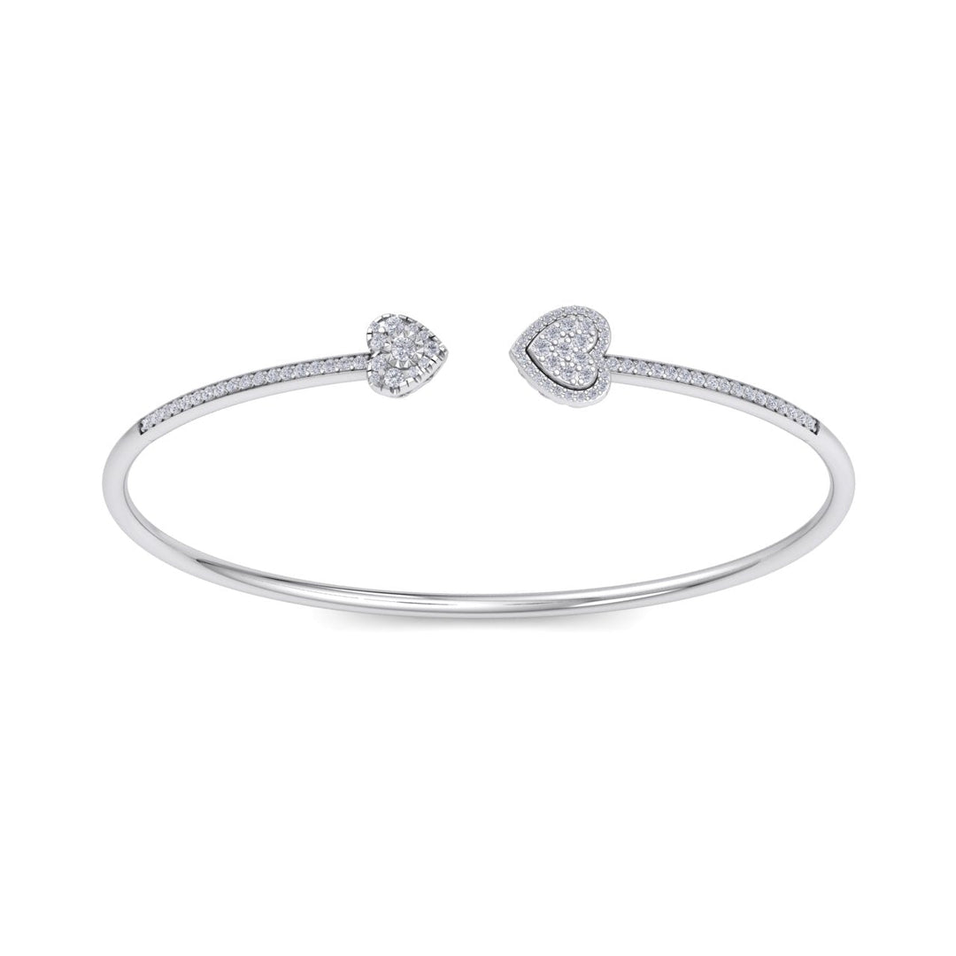 Hearts cuff bracelet in yellow gold with white diamonds of 0.56 ct in weight