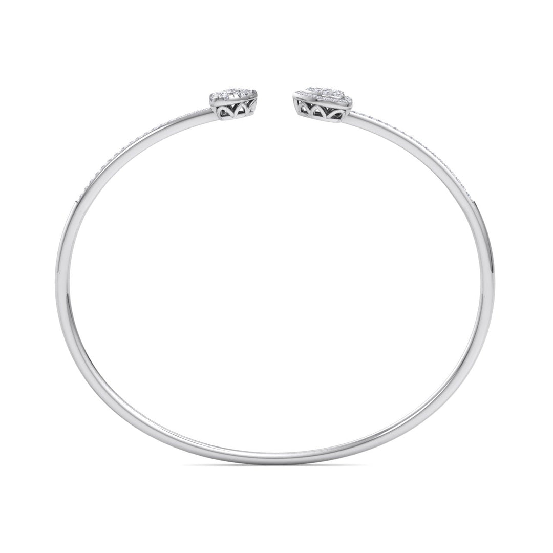 Hearts cuff bracelet in yellow gold with white diamonds of 0.56 ct in weight