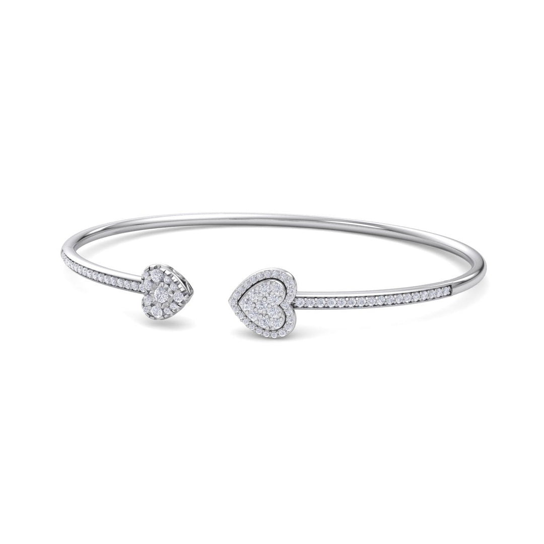 Hearts cuff bracelet in yellow gold with white diamonds of 0.56 ct in weight
