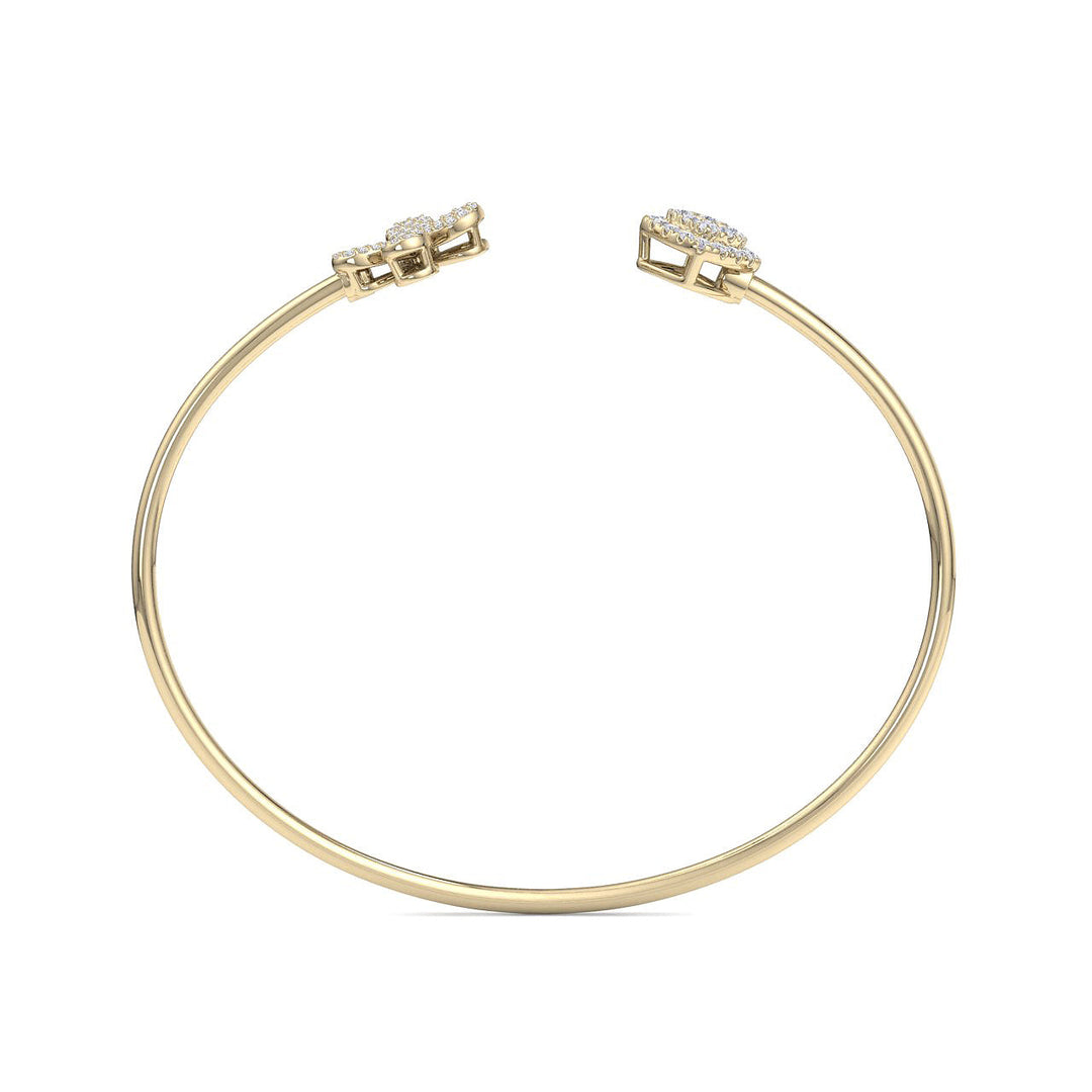 Cuff bracelet in yellow gold with white diamonds of 0.52 ct in weight