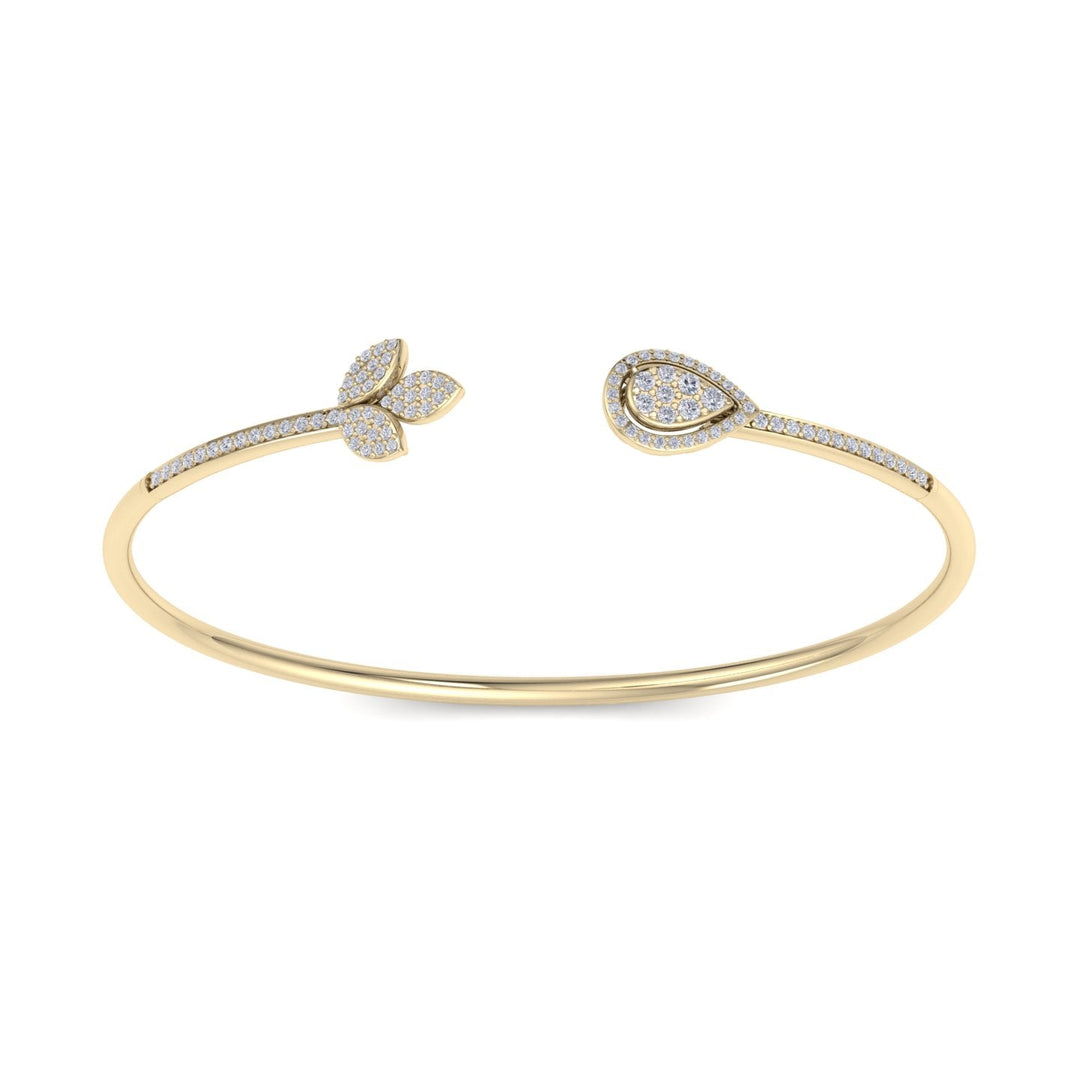 Diamond cuff bracelet in yellow gold with white diamonds of 0.56 ct in weight