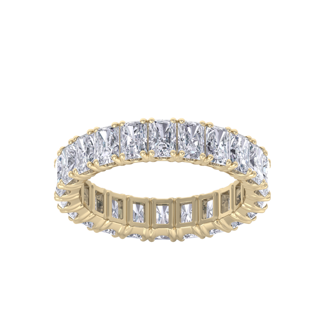 Eternity ring in yellow gold with emeralds white diamonds of 4.18 ct in weight