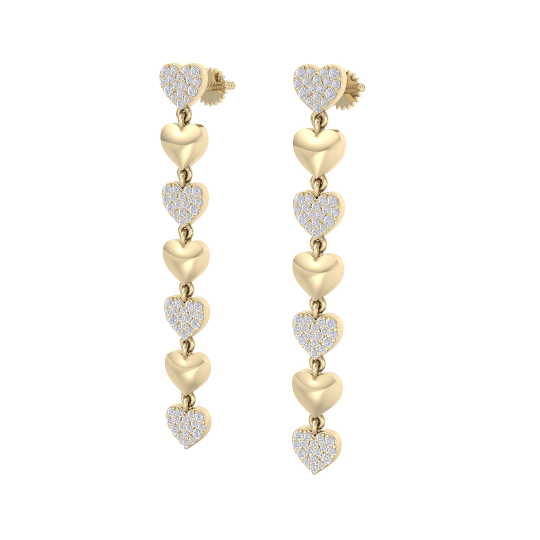 Dangle earrings with gold hearts in white gold with white diamonds of 1.01 ct in weight