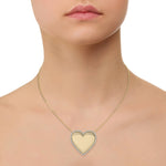 Load image into Gallery viewer, Heart pendant in yellow gold with white diamonds of 0.33 ct in weight