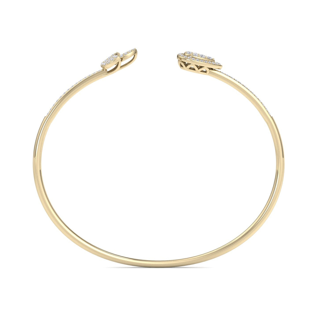 Diamond cuff bracelet in yellow gold with white diamonds of 0.56 ct in weight