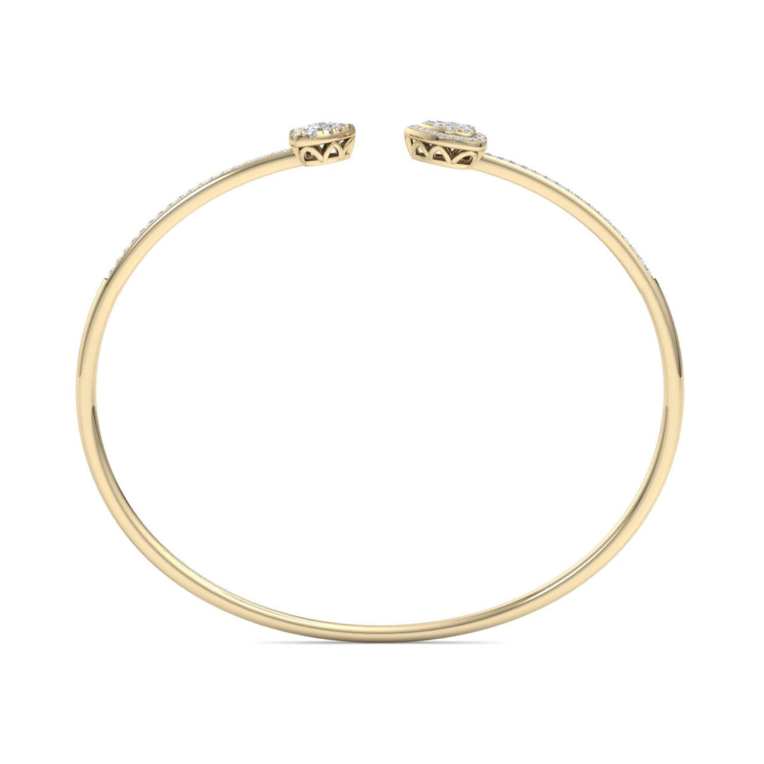 Hearts cuff bracelet in yellow gold with white diamonds of 0.56 ct in weight