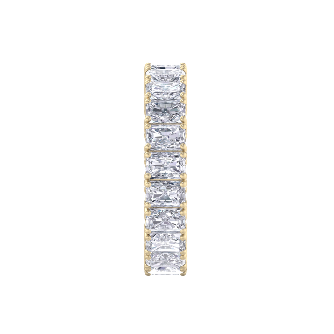 Eternity ring in yellow gold with emeralds white diamonds of 4.18 ct in weight