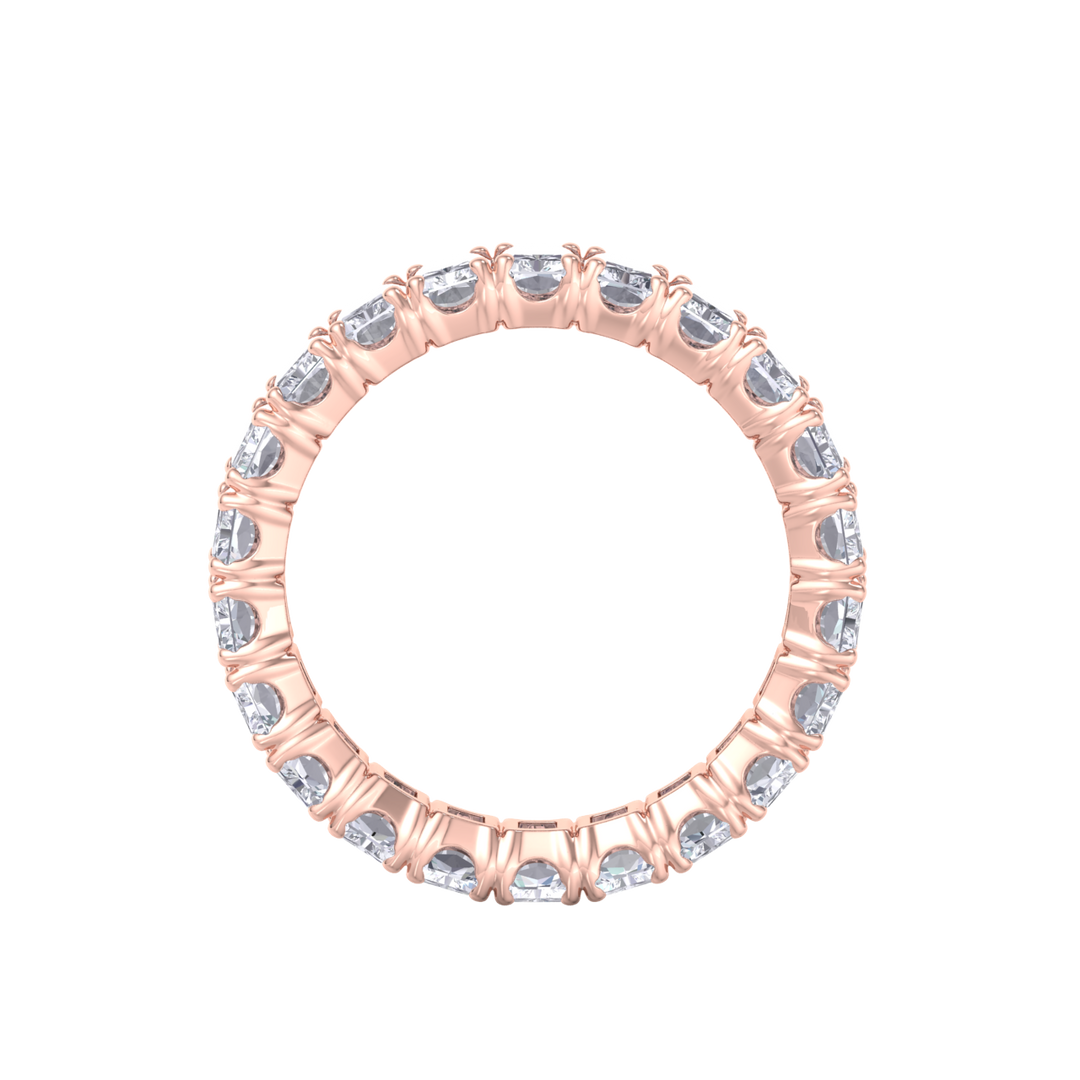 Eternity ring in yellow gold with emeralds white diamonds of 4.18 ct in weight