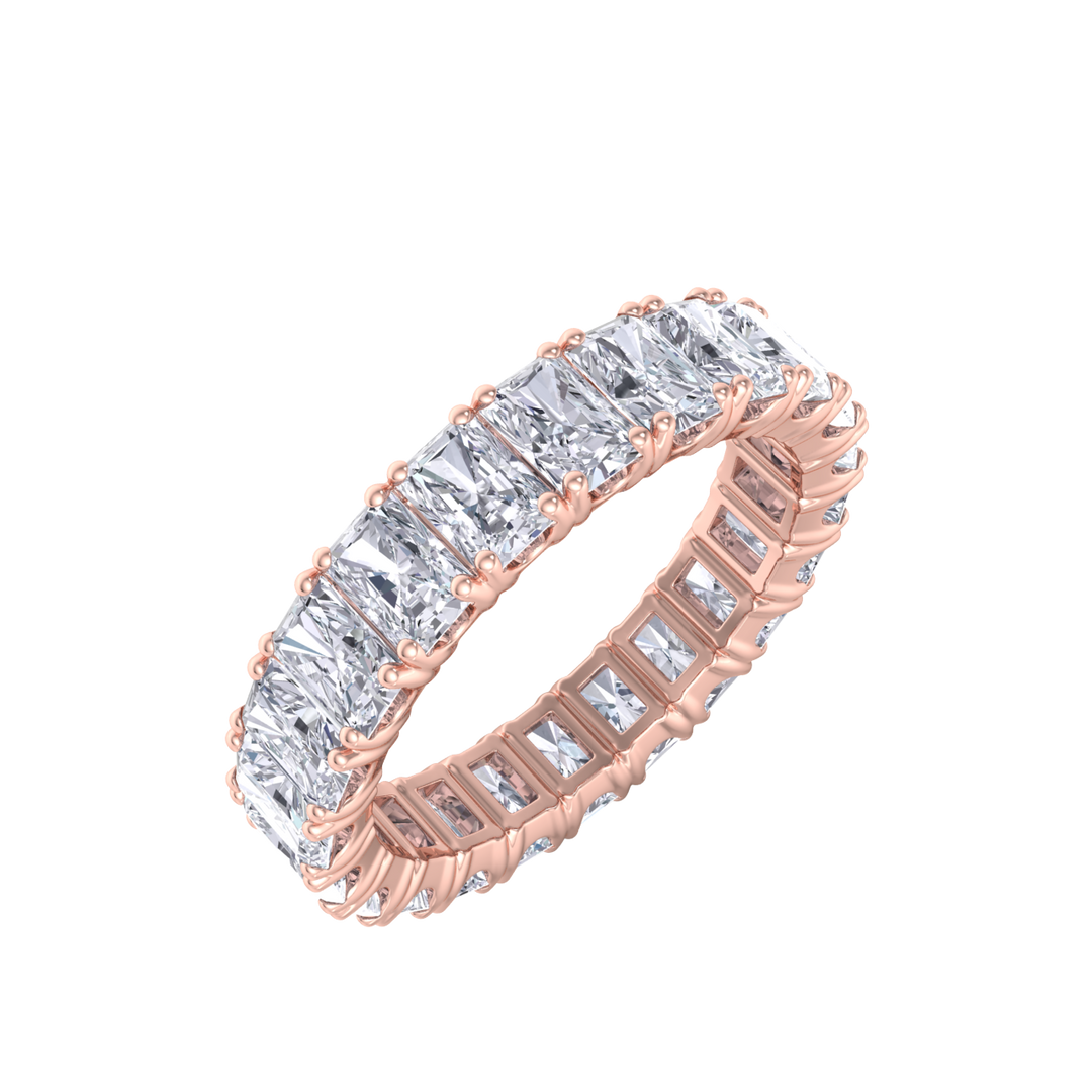 Eternity ring in yellow gold with emeralds white diamonds of 4.18 ct in weight