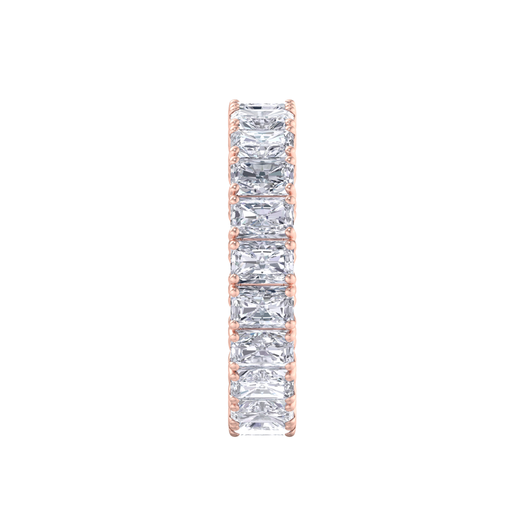 Eternity ring in yellow gold with emeralds white diamonds of 4.18 ct in weight