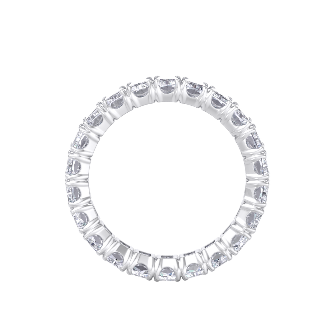 Eternity ring in yellow gold with emeralds white diamonds of 4.18 ct in weight