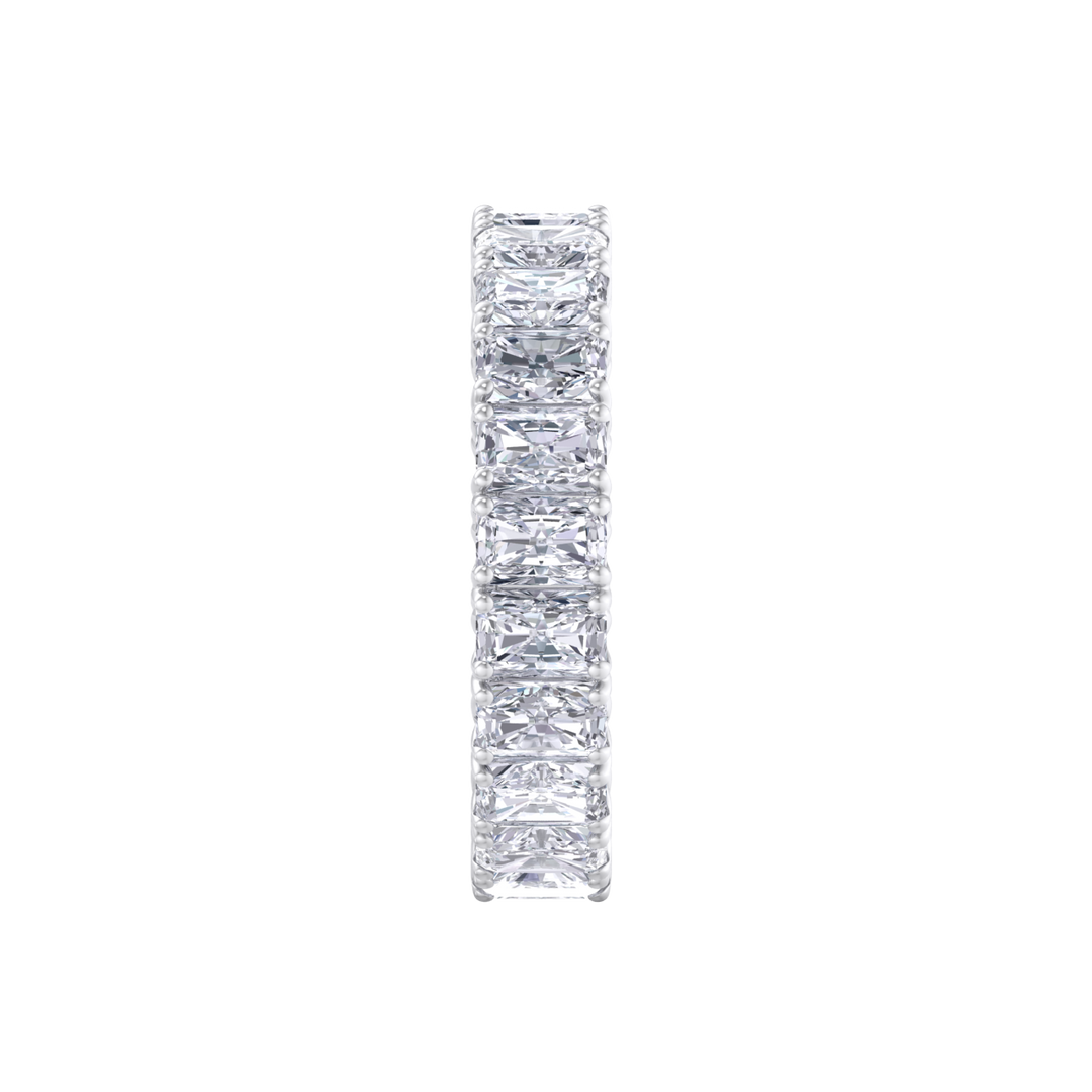 Eternity ring in yellow gold with emeralds white diamonds of 4.18 ct in weight