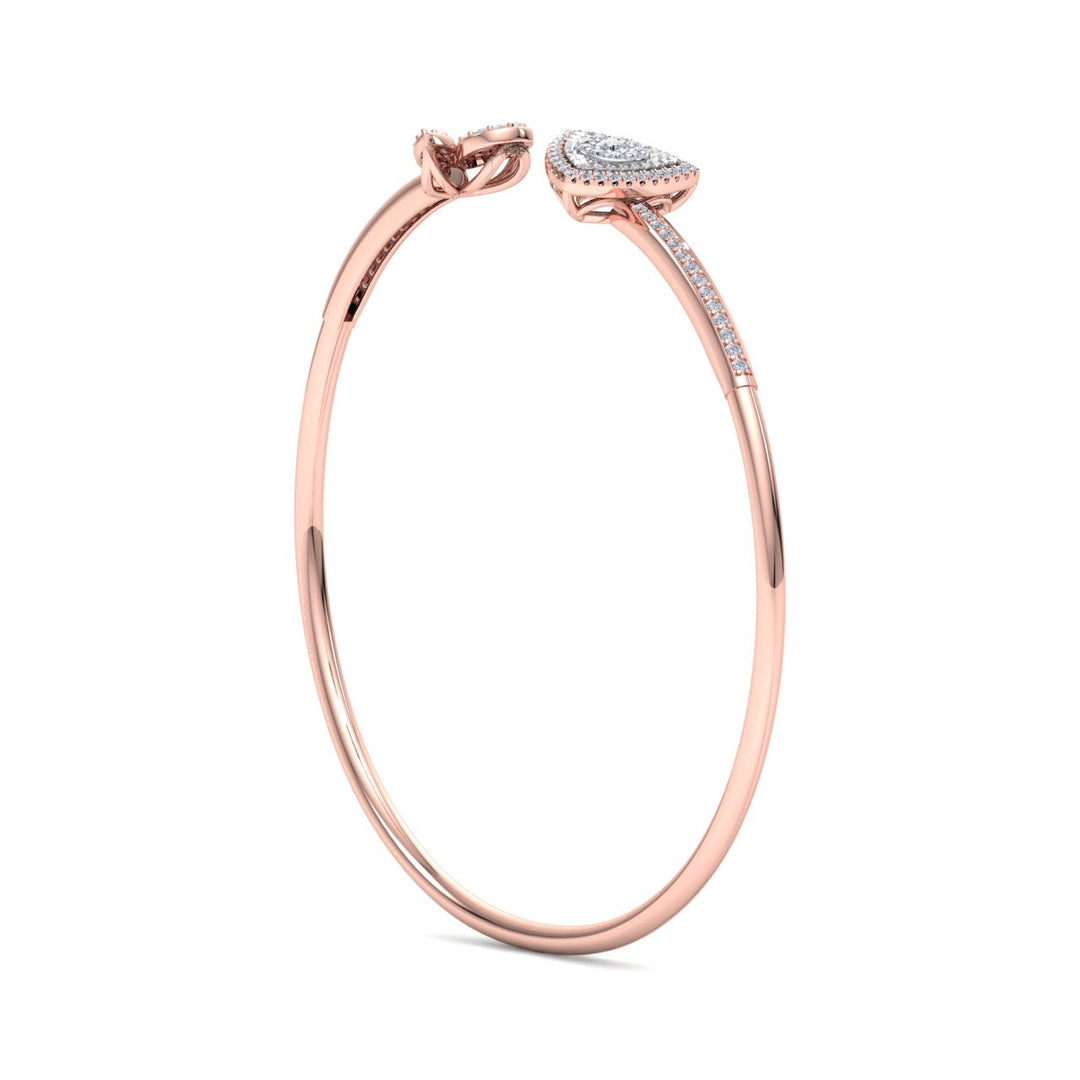 Beautiful cuff bracelet in yellow gold with white diamonds of 0.52 ct in weight