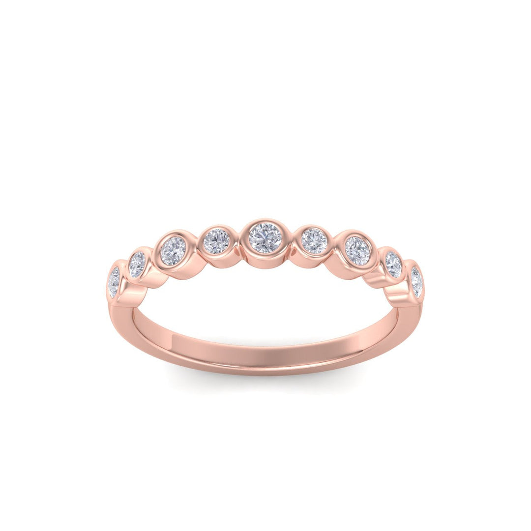 Milgrain wedding band in rose gold with white diamonds of 0.25 ct in weight