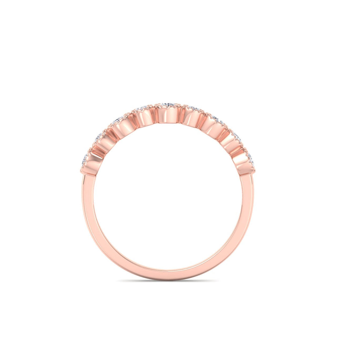 Milgrain wedding band in rose gold with white diamonds of 0.25 ct in weight