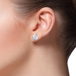 Load image into Gallery viewer, Pear shaped stud earrings in yellow gold with white diamonds of 0.13 ct in weight
