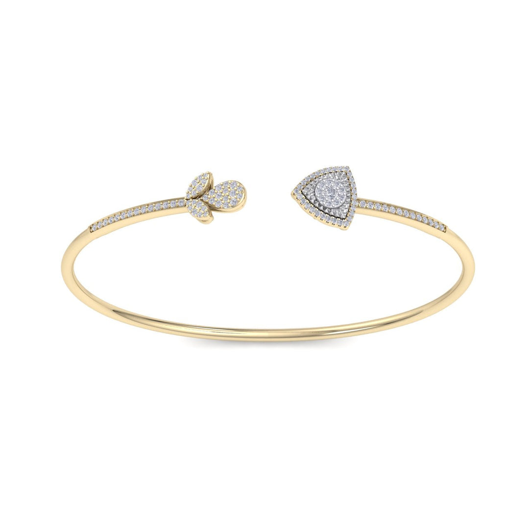 Beautiful cuff bracelet in yellow gold with white diamonds of 0.52 ct in weight