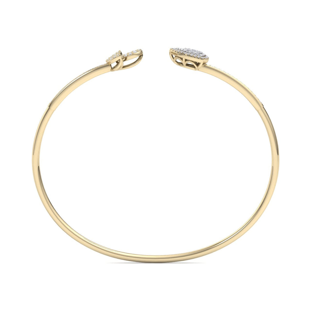Beautiful cuff bracelet in yellow gold with white diamonds of 0.52 ct in weight
