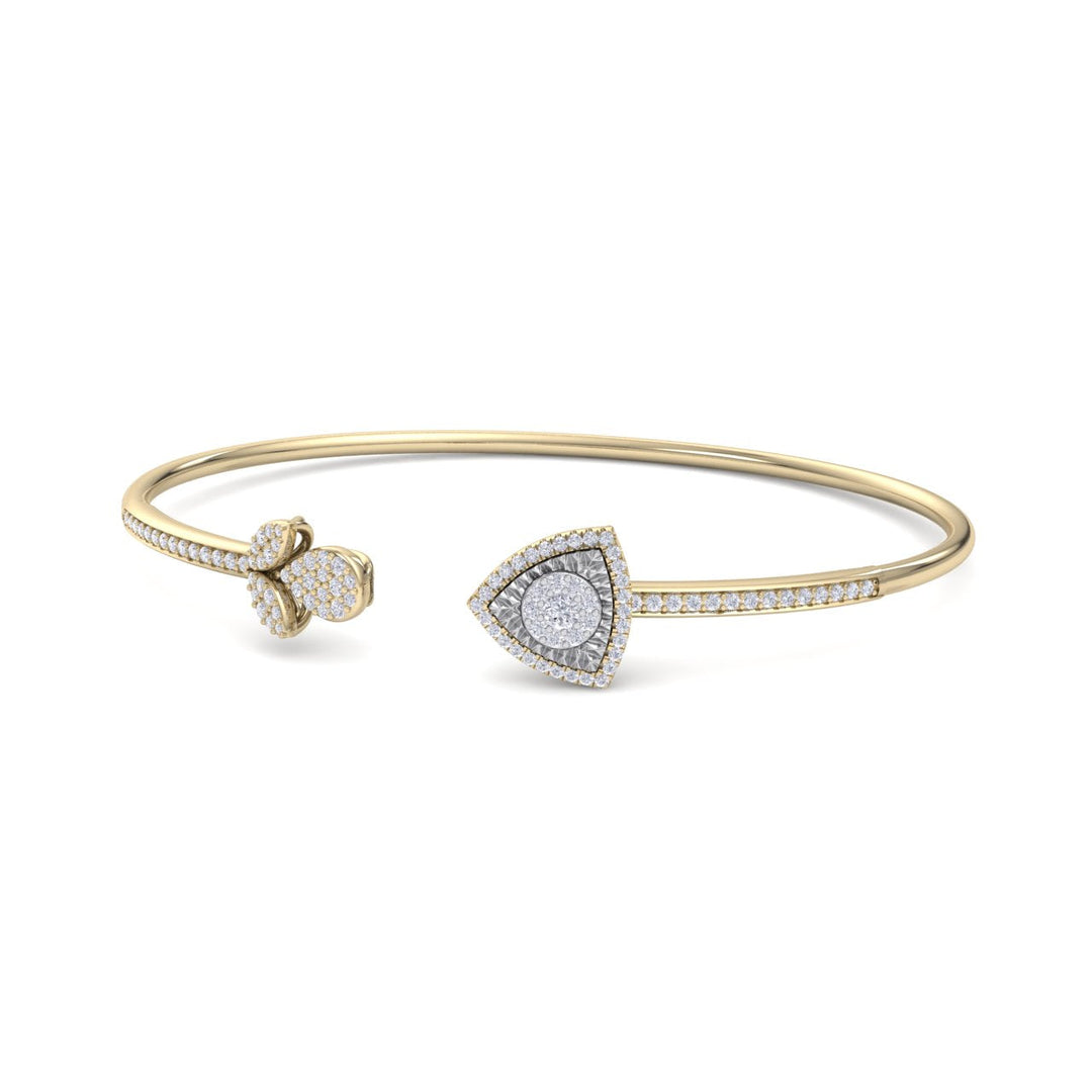 Beautiful cuff bracelet in yellow gold with white diamonds of 0.52 ct in weight